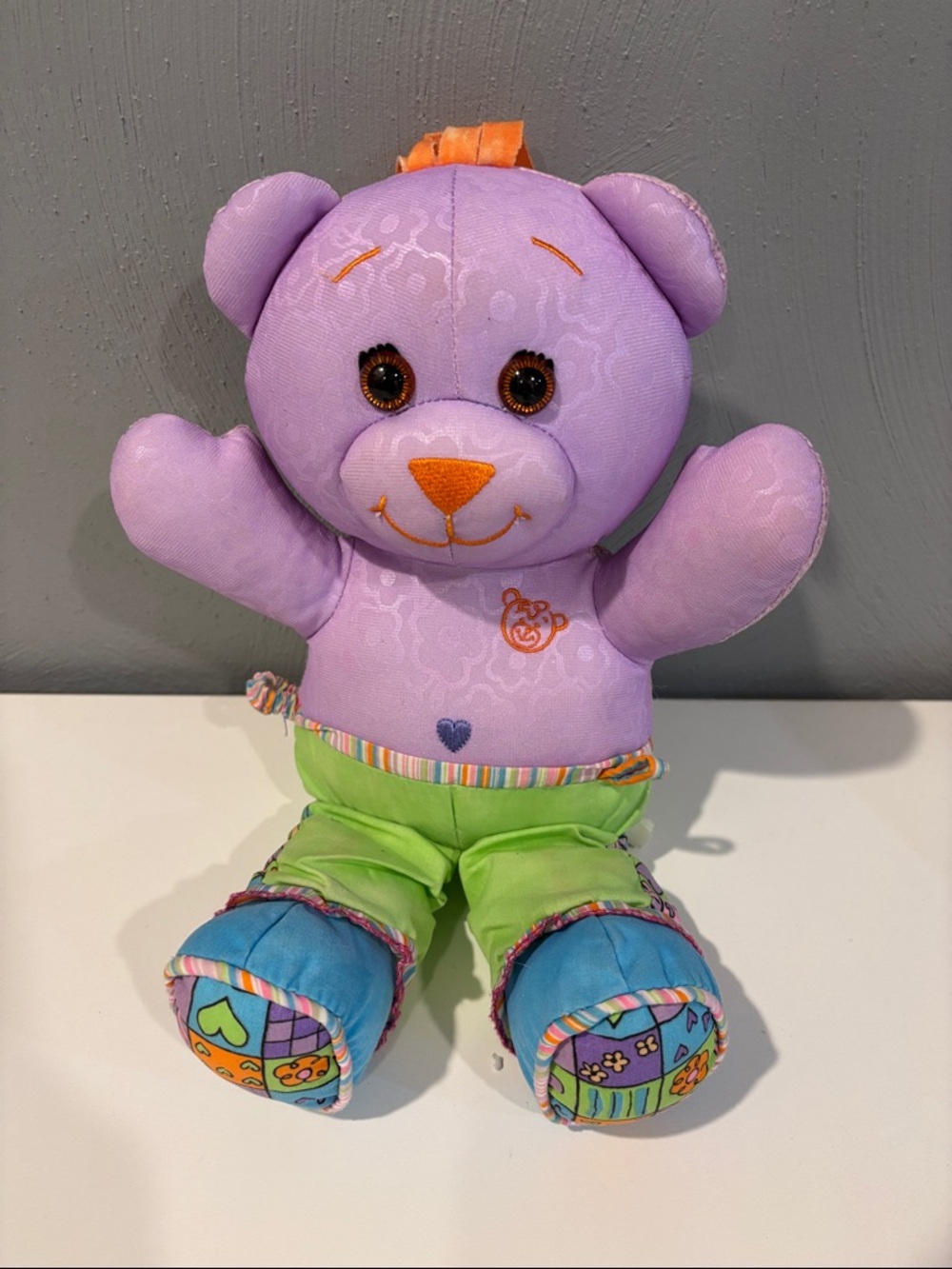 Doodle Bear Purple Plush Bear with Green Pants and Patterned Blue Feet